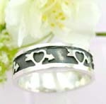 Sterling silver ring with heart and arrow pattern